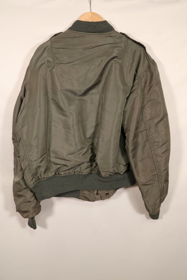 Real 1950s lot USAF L2-B flight jacket without size label, dirty and scratched, used.