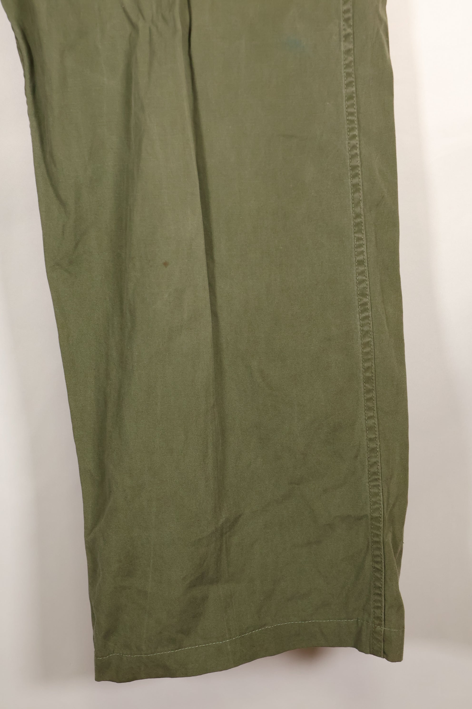 1964 Contract S-L with hemming 1st Model Jungle Fatigue Pants, used with fading.