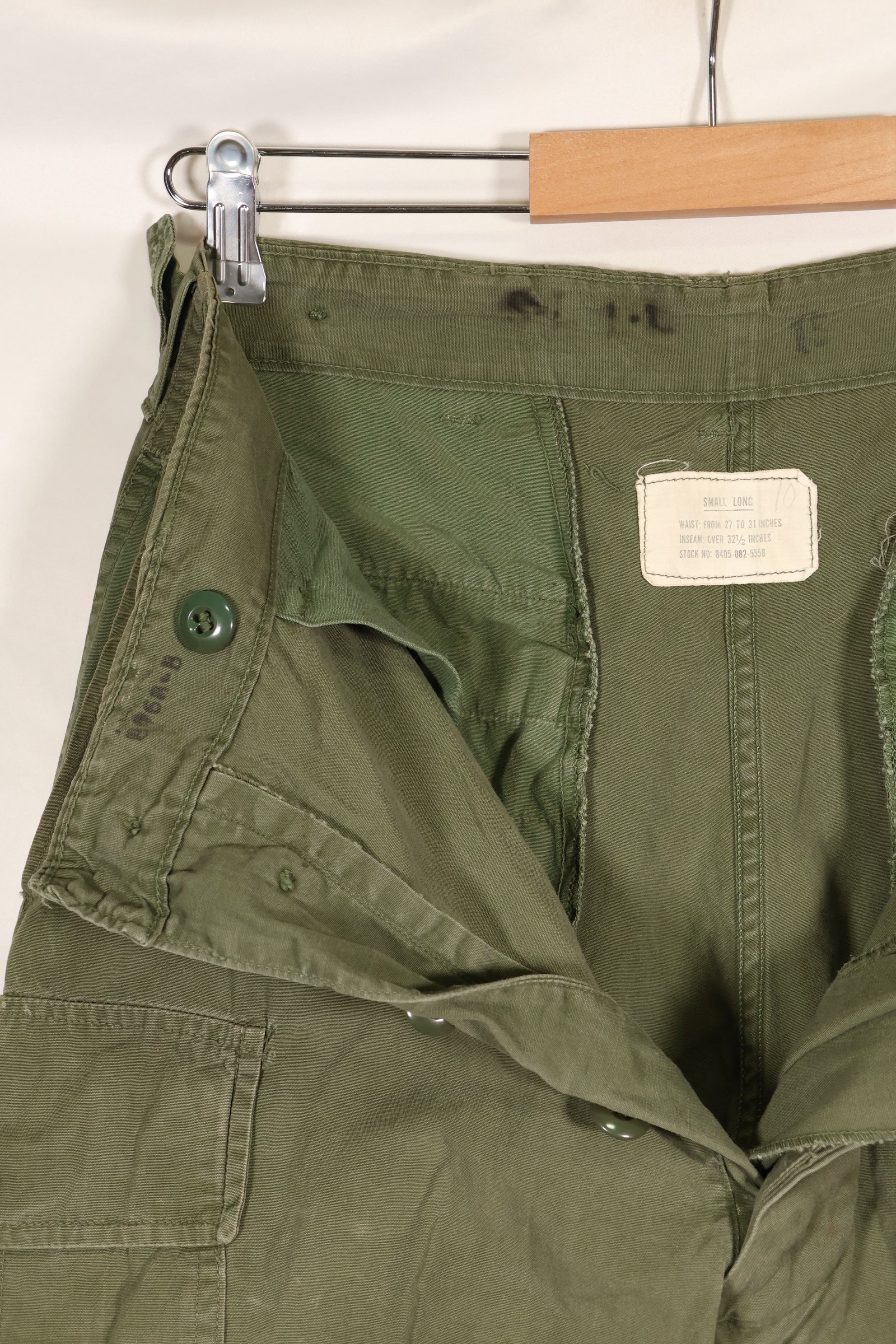 1964 Contract S-L with hemming 1st Model Jungle Fatigue Pants, used with fading.