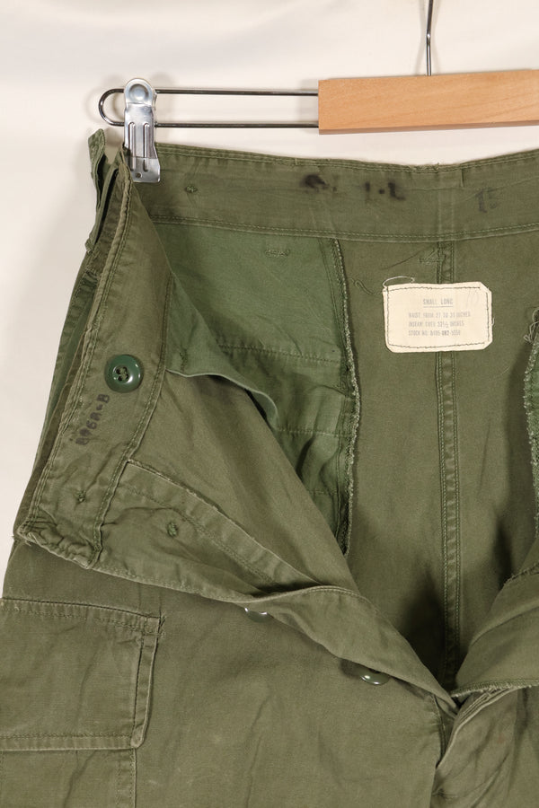 1964 Contract S-L with hemming 1st Model Jungle Fatigue Pants, used with fading.