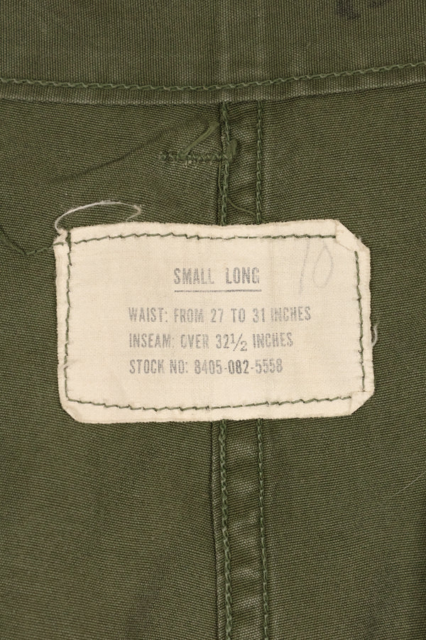 1964 Contract S-L with hemming 1st Model Jungle Fatigue Pants, used with fading.