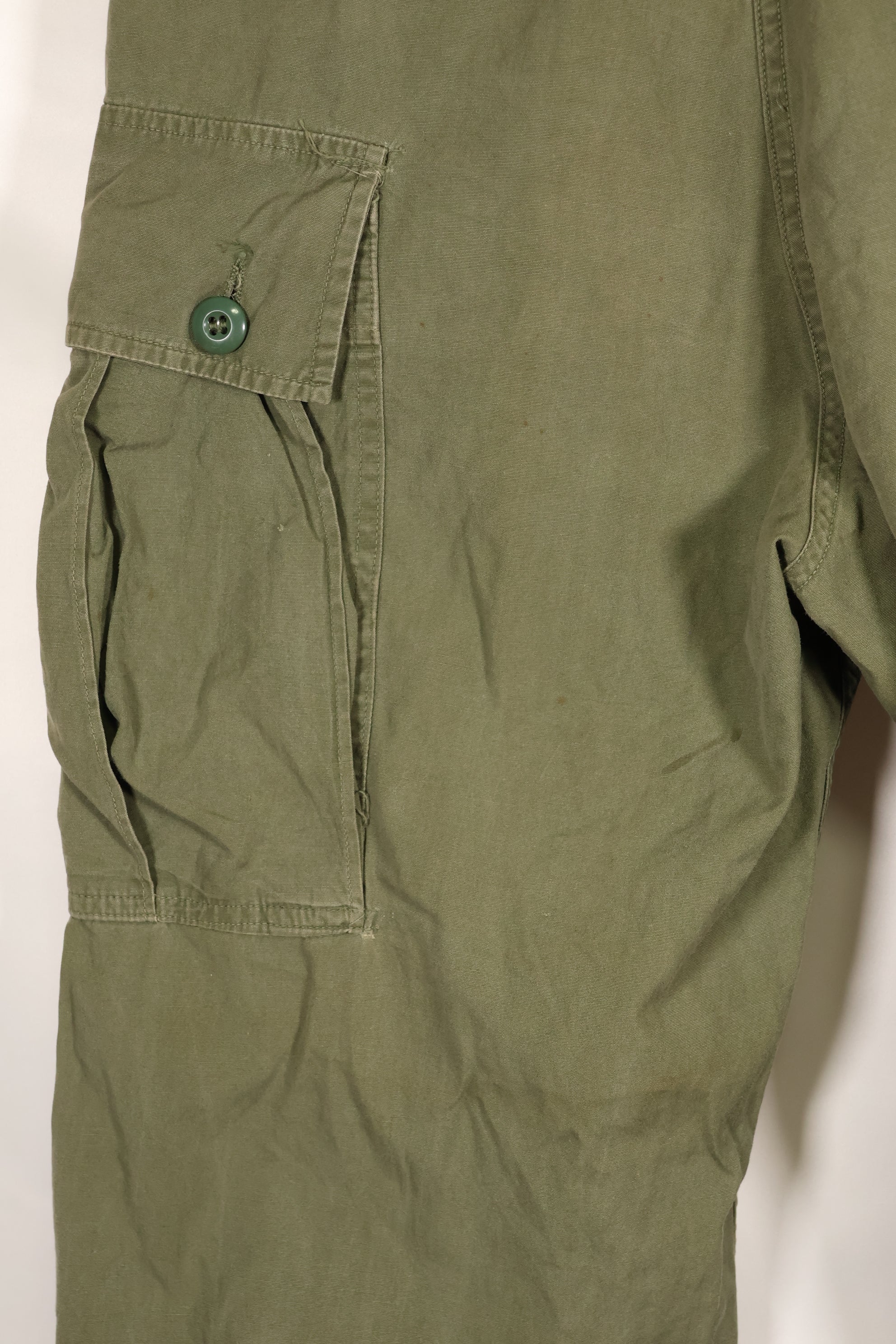 1964 Contract S-L with hemming 1st Model Jungle Fatigue Pants, used with fading.