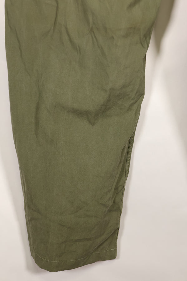 1964 Contract S-L with hemming 1st Model Jungle Fatigue Pants, used with fading.