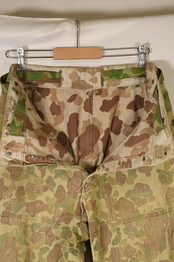 1940s WWII USMC P-44 Frogskin camouflage duck hunter pants, repaired, used.