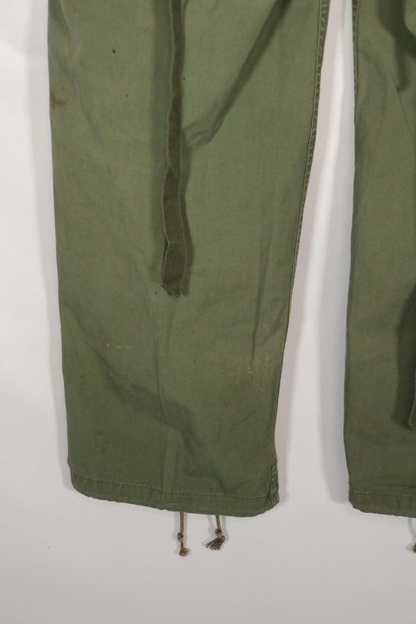 Real 1963 1st Model Jungle Fatigue Pants with leg ties, used.