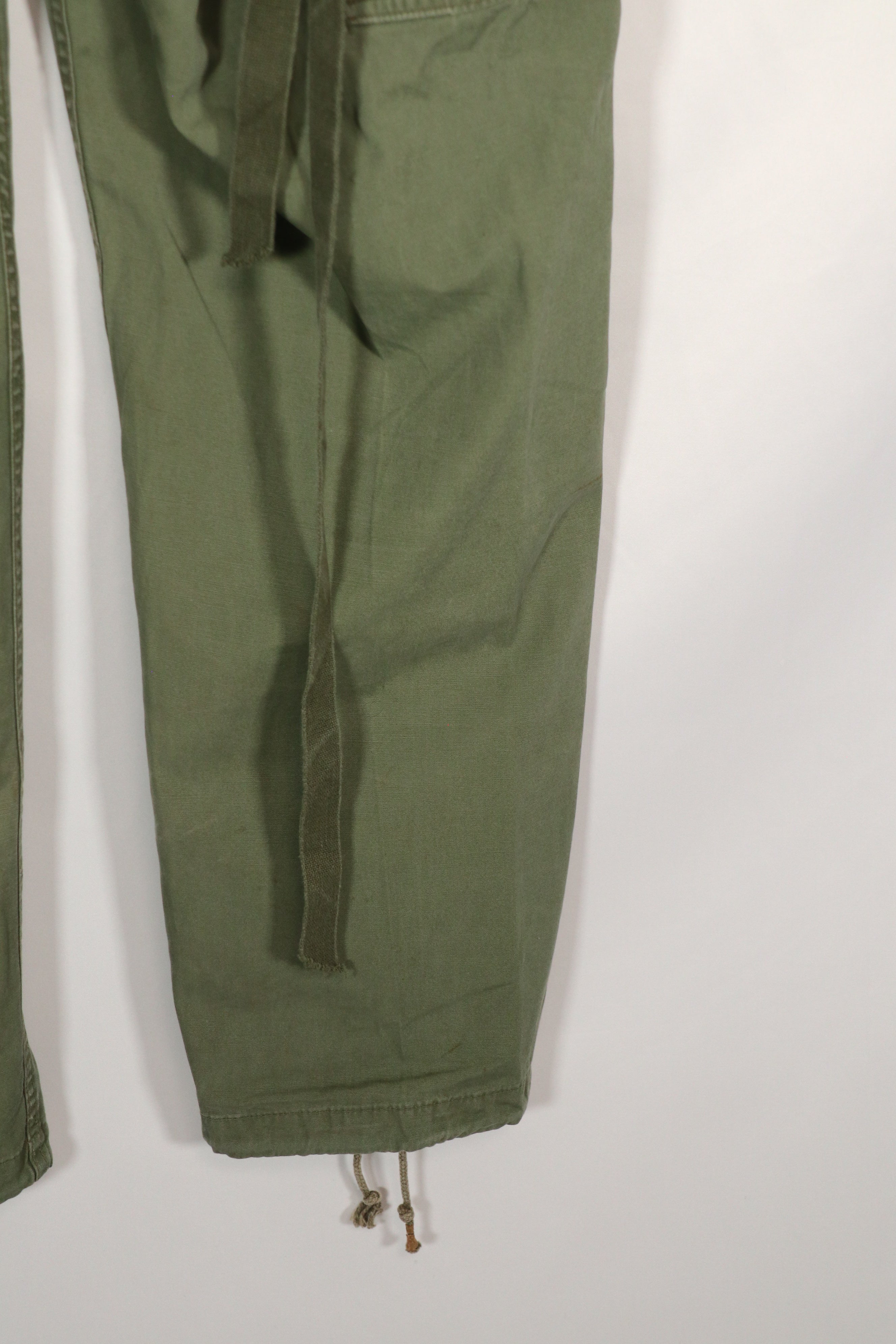 Real 1963 1st Model Jungle Fatigue Pants with leg ties, used.