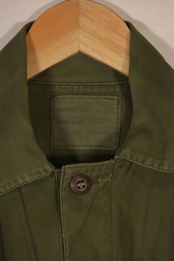 Real 1970 Australian Army OD Fatigue shirt with rank insignia, size unreadable.