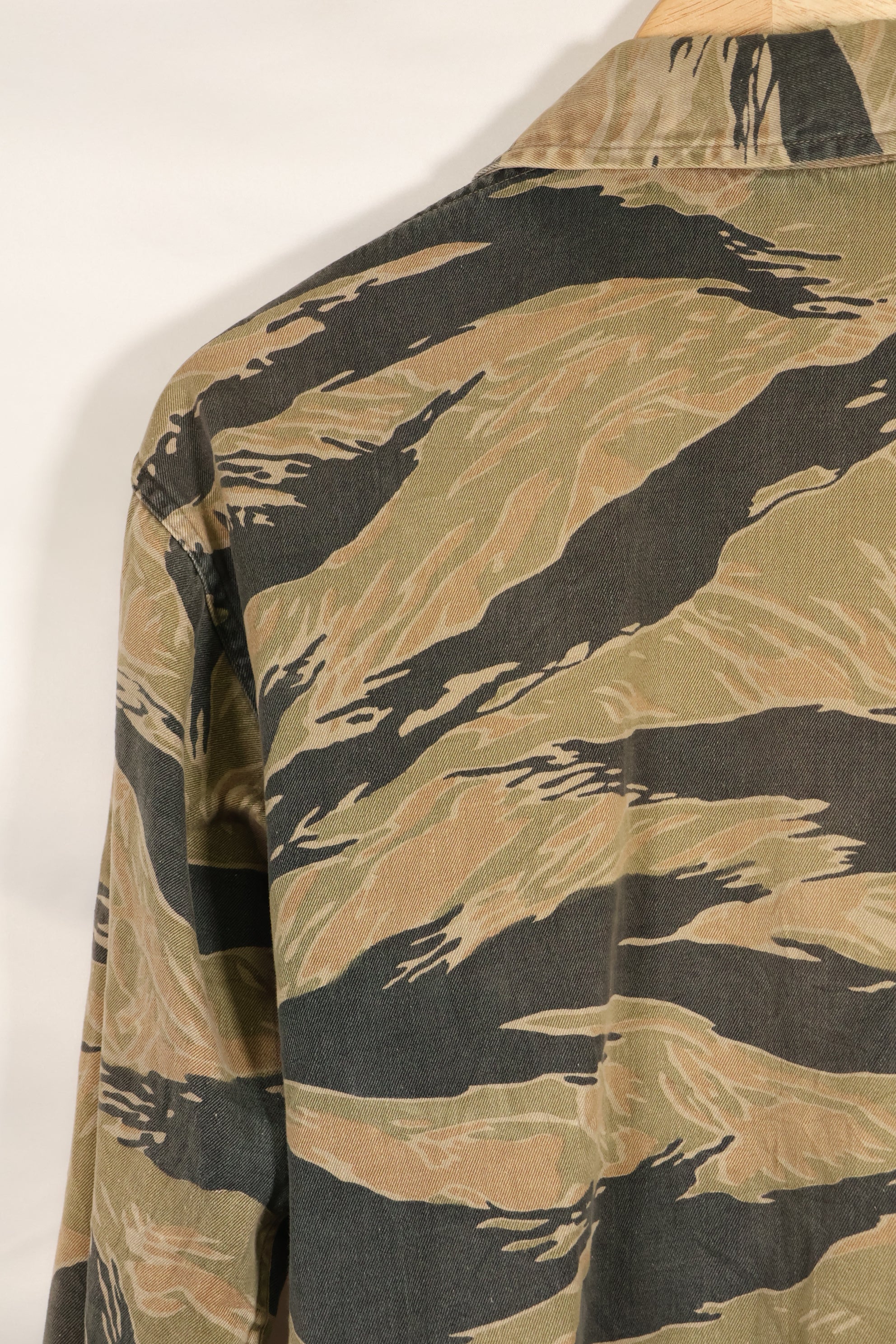 Estimated late 1960s-1970s locally made tiger stripe shirt, used.