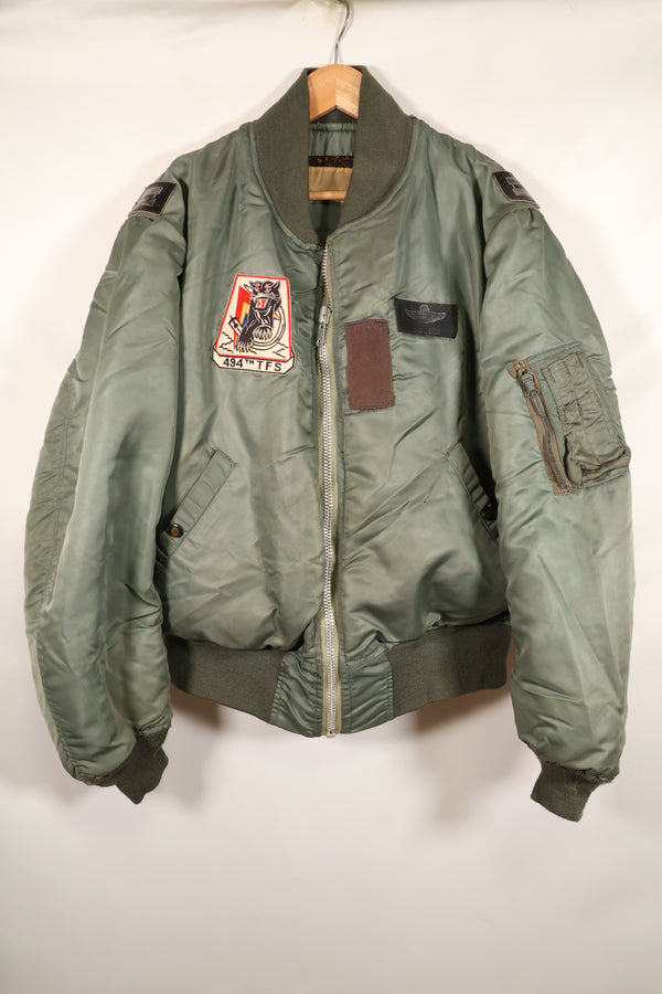 1950s, estimated size 40–42, U.S. Air Force B-15D flight jacket, modified with shearling, includes patches, used
