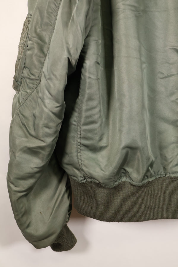 1950s, estimated size 40–42, U.S. Air Force B-15D flight jacket, modified with shearling, includes patches, used