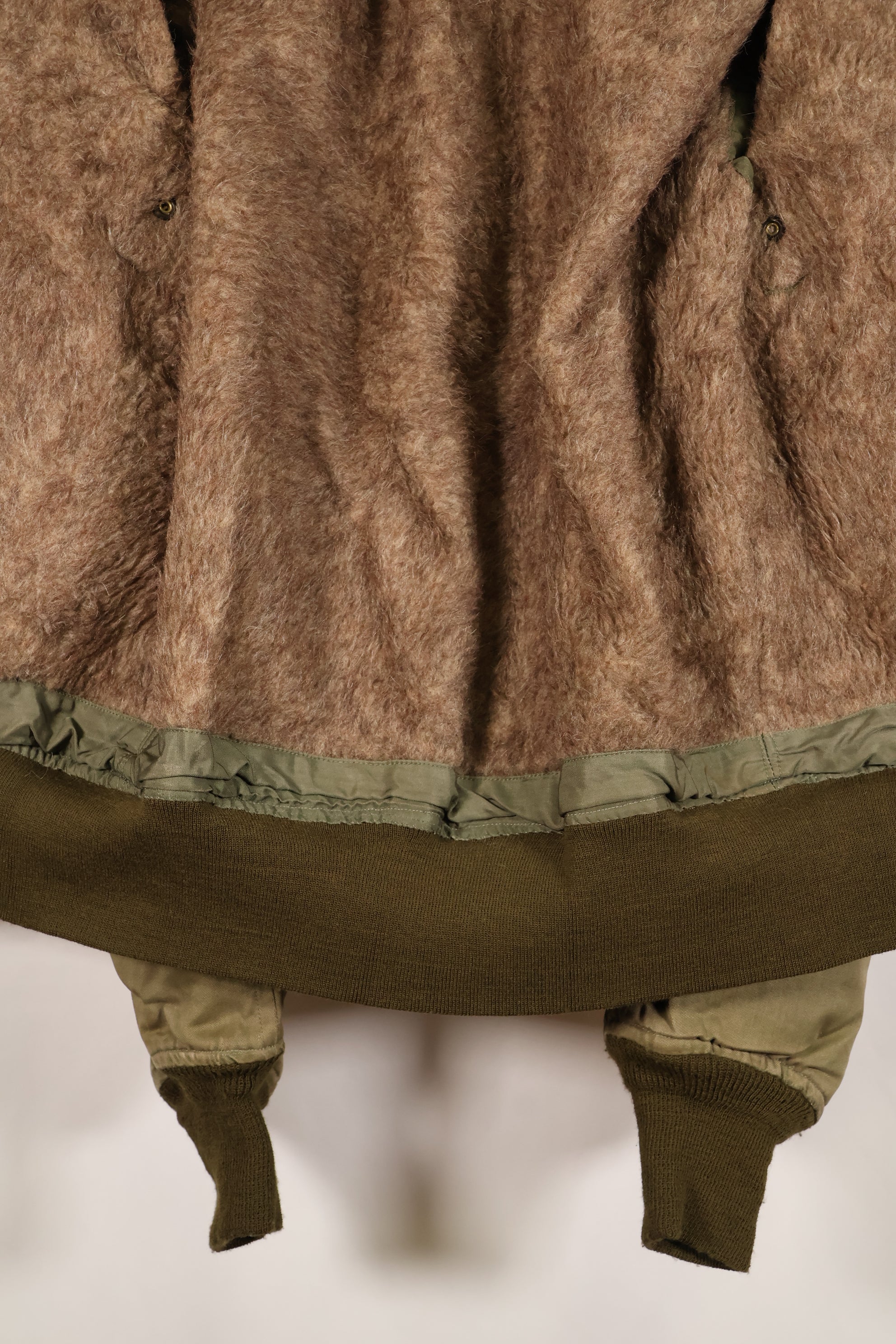 1940s, estimated age 38–40, U.S. Army Air Forces (USAAF) B-15A flight jacket, modified with shearling, used