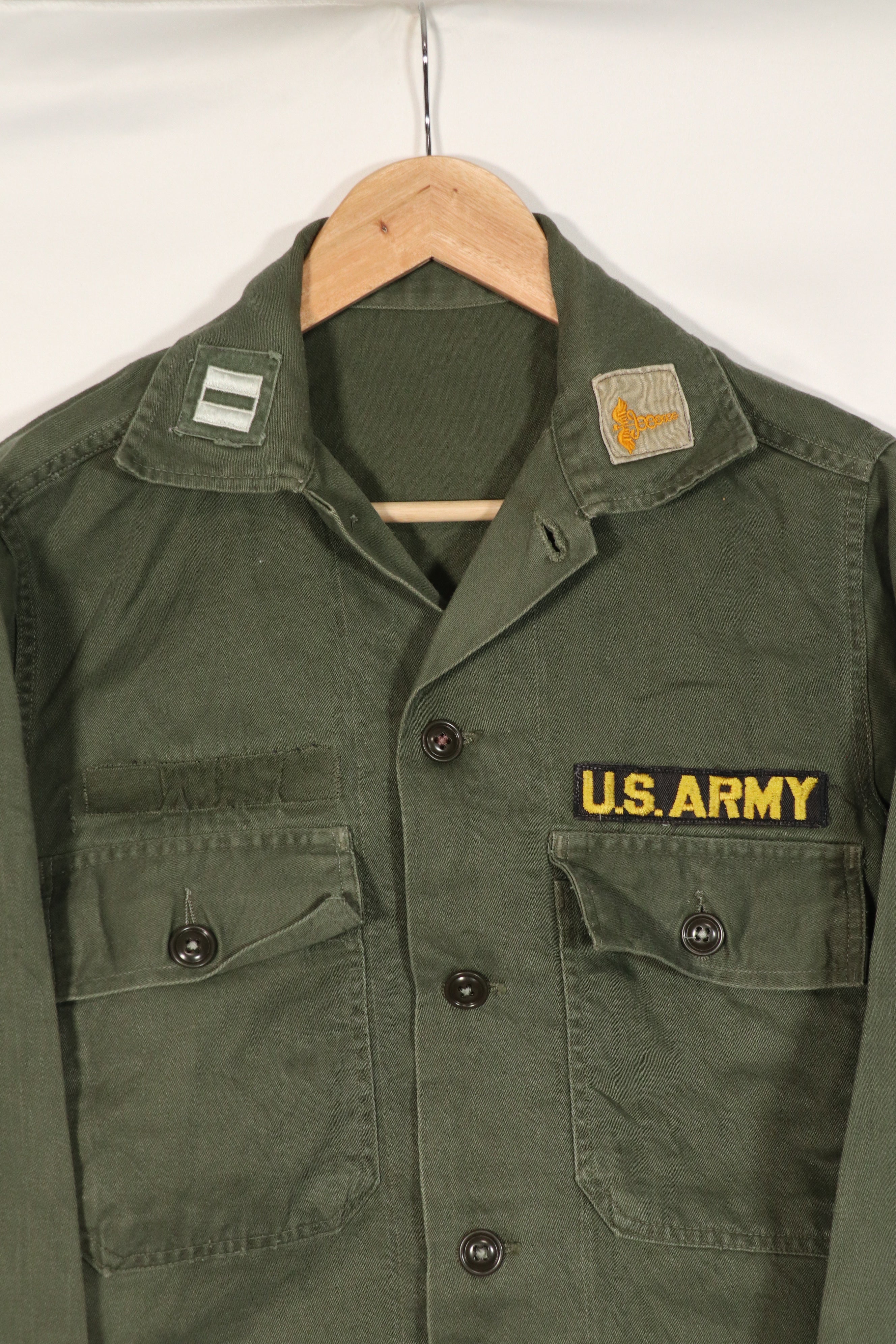 Real U.S. Army OG-107 Utility Shirt with insignia, retrofitted, used.