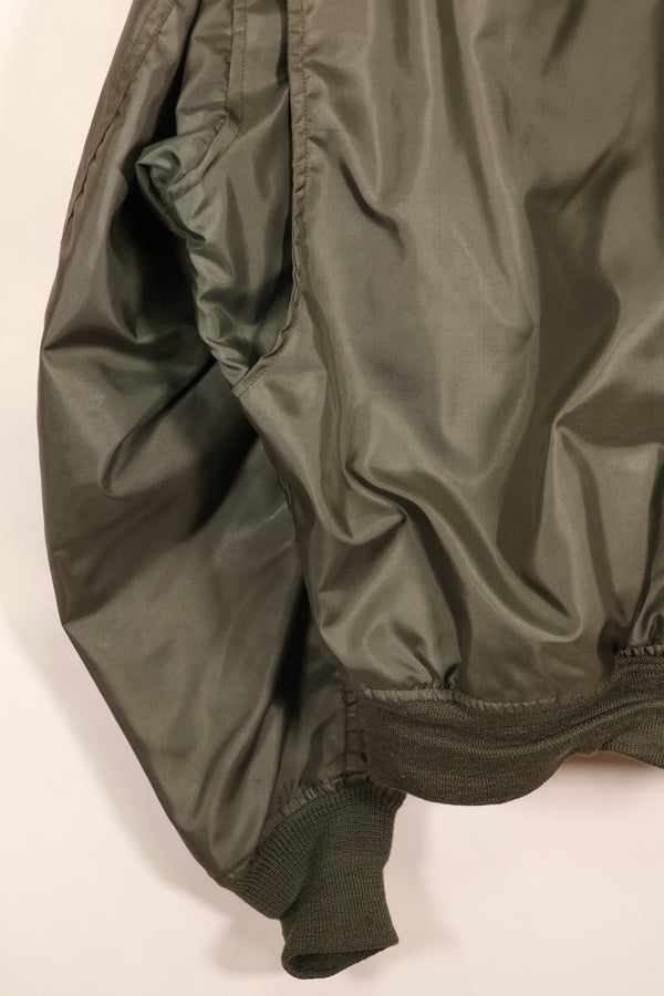Estimated 1983 Contract, LARGE, U.S. Navy, CWU-45P Flight Jacket with Pleats, Used