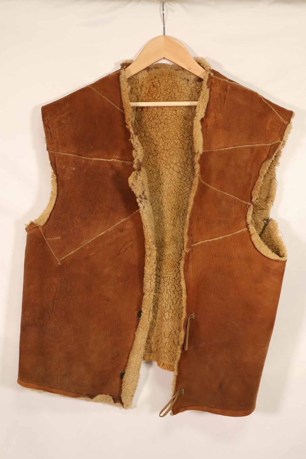 Civilian 1960s-70s sheepskin vest, used, scratches, stains.