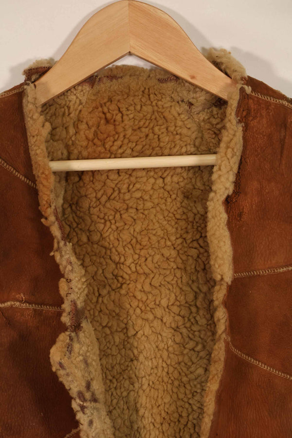 Civilian 1960s-70s sheepskin vest, used, scratches, stains.