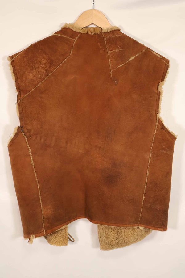 Civilian 1960s-70s sheepskin vest, used, scratches, stains.