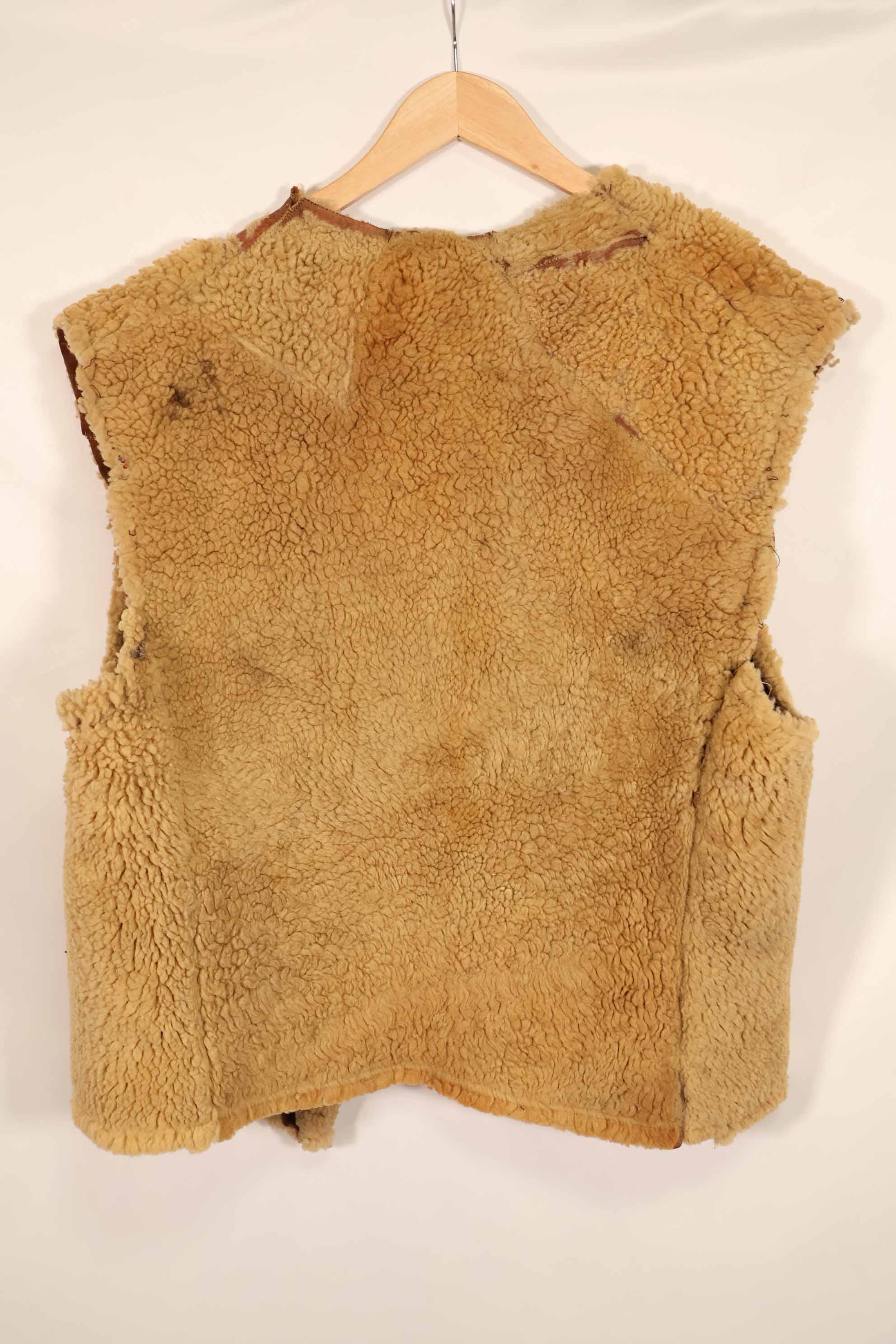 Civilian 1960s-70s sheepskin vest, used, scratches, stains.