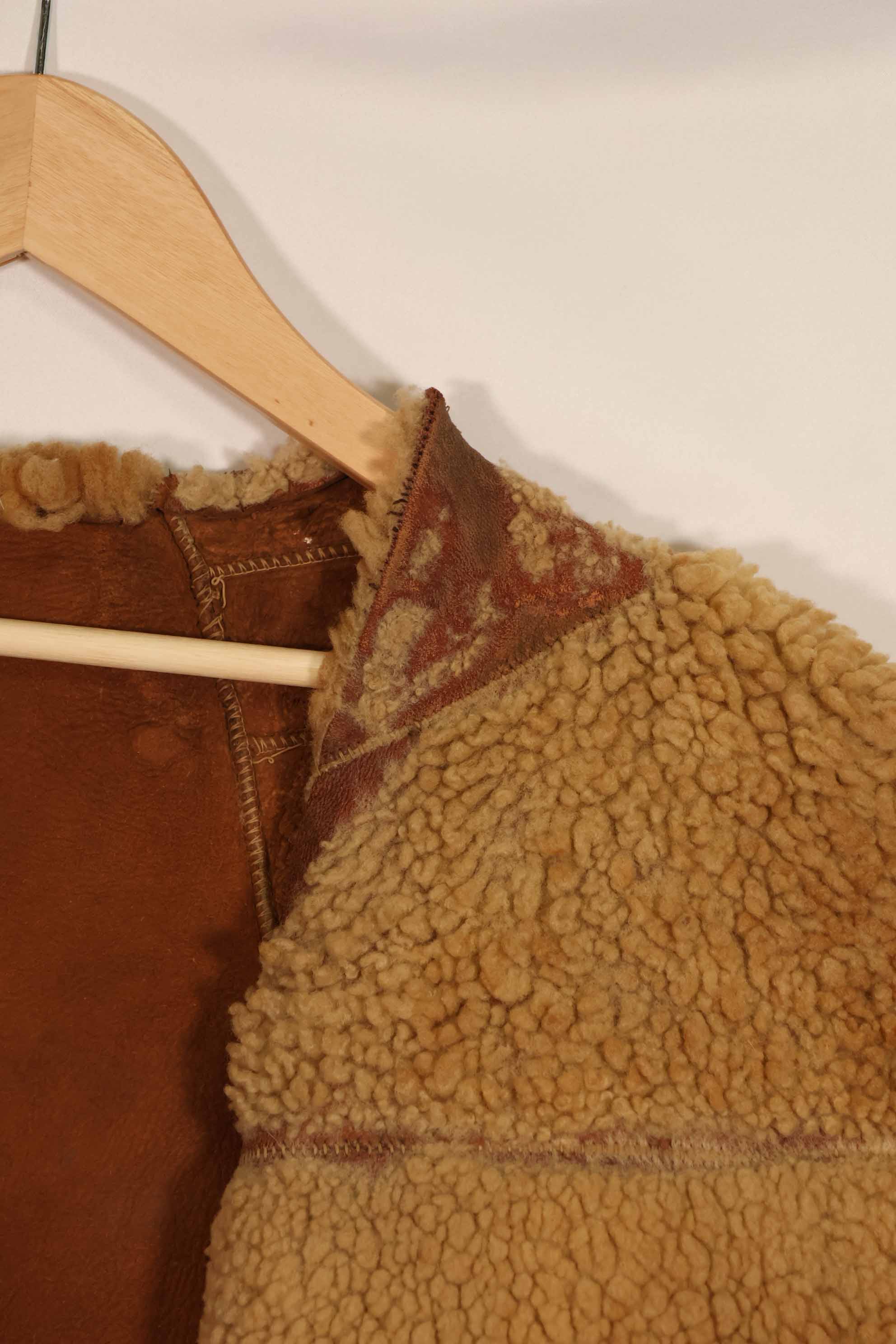 Civilian 1960s-70s sheepskin vest, used, scratches, stains.