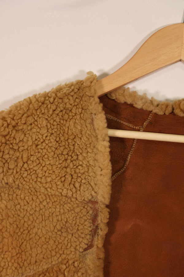 Civilian 1960s-70s sheepskin vest, used, scratches, stains.