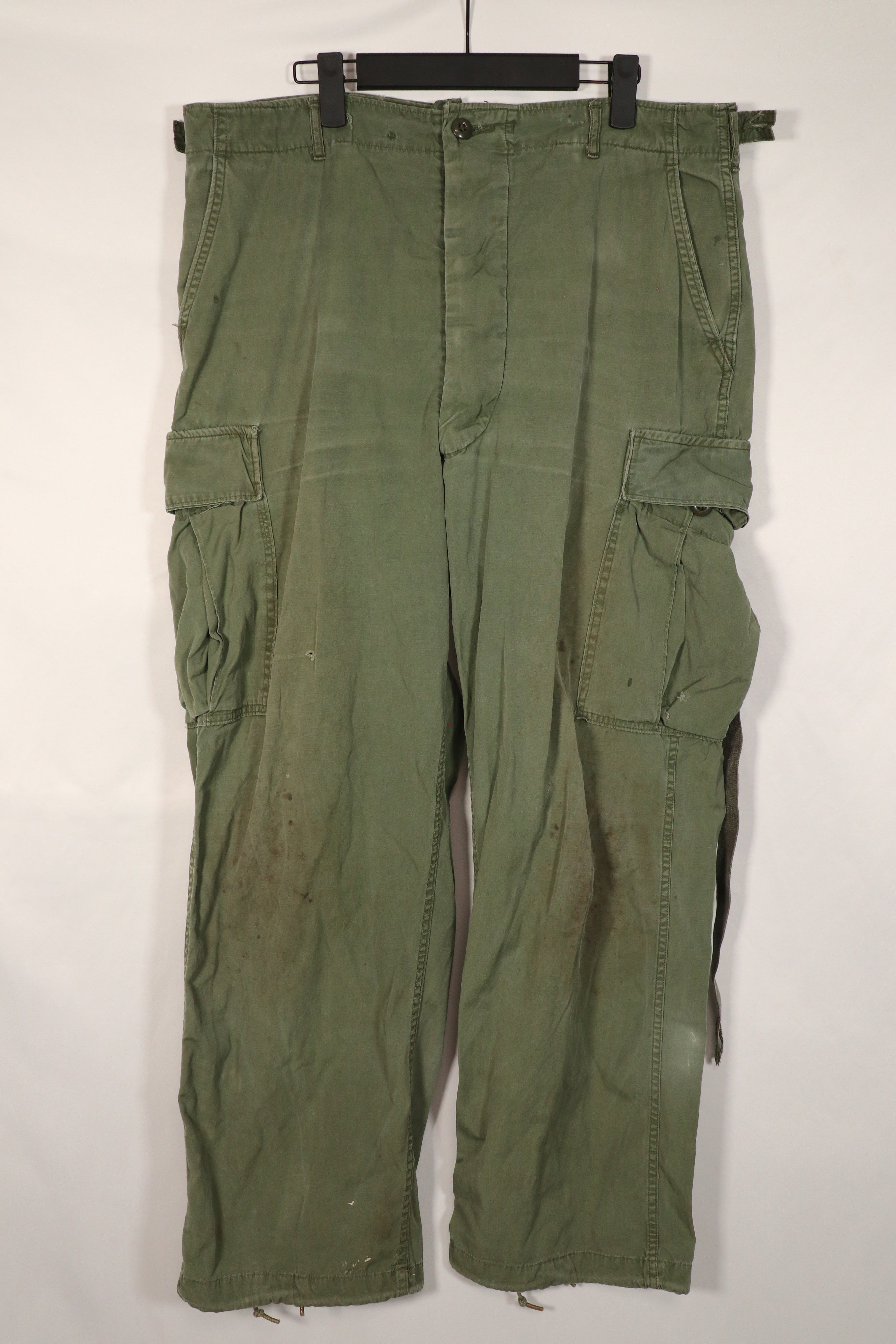 Real 2nd Model Jungle Fatigue Pants with leg ties, large size, stained, used.