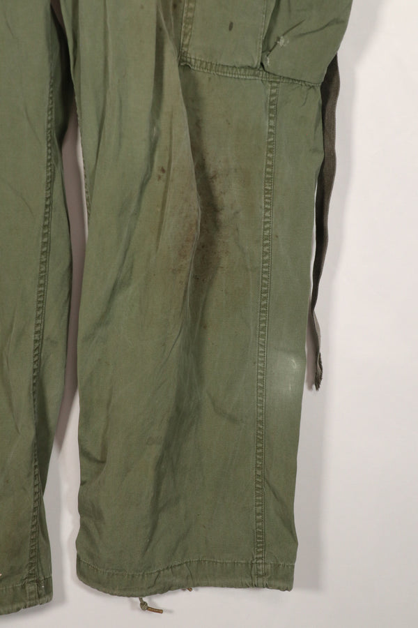 Real 2nd Model Jungle Fatigue Pants with leg ties, large size, stained, used.