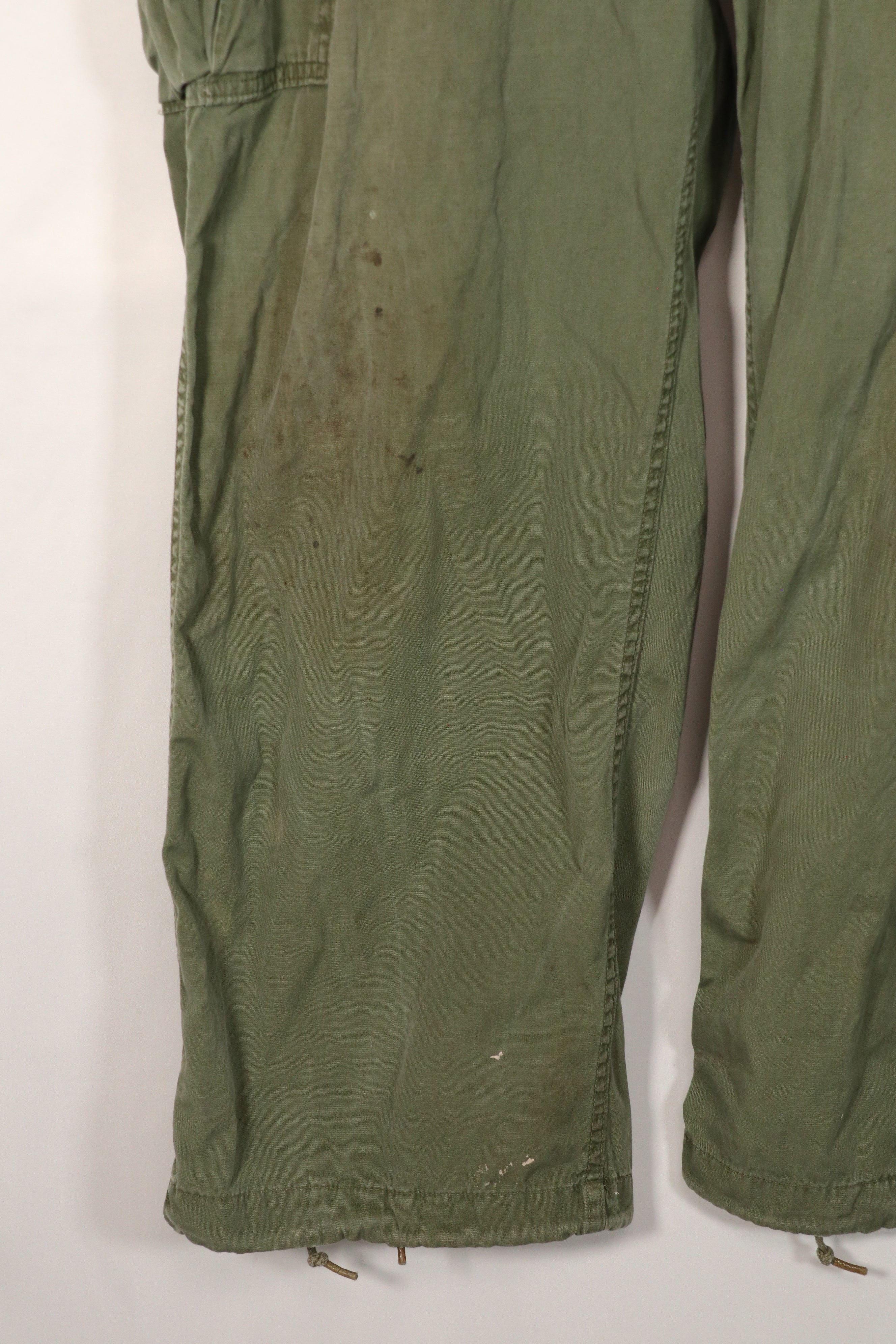 Real 2nd Model Jungle Fatigue Pants with leg ties, large size, stained, used.