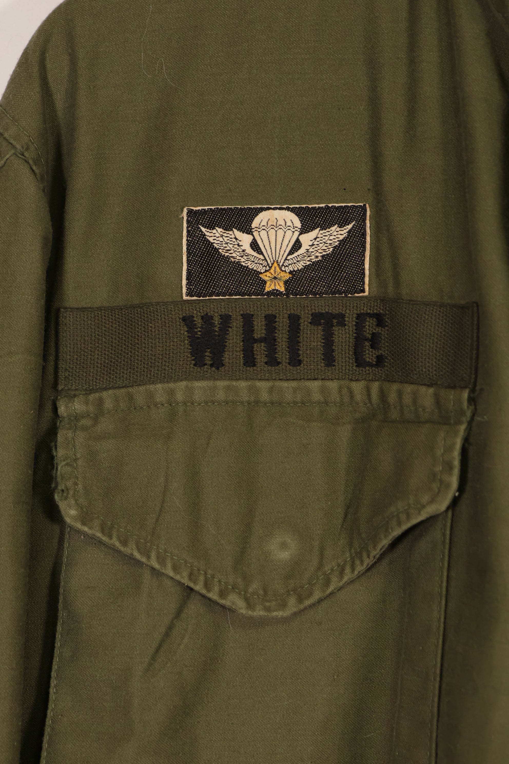 Real owned by former SF member, first model M65 field jacket, estimated 1965-1966, used.