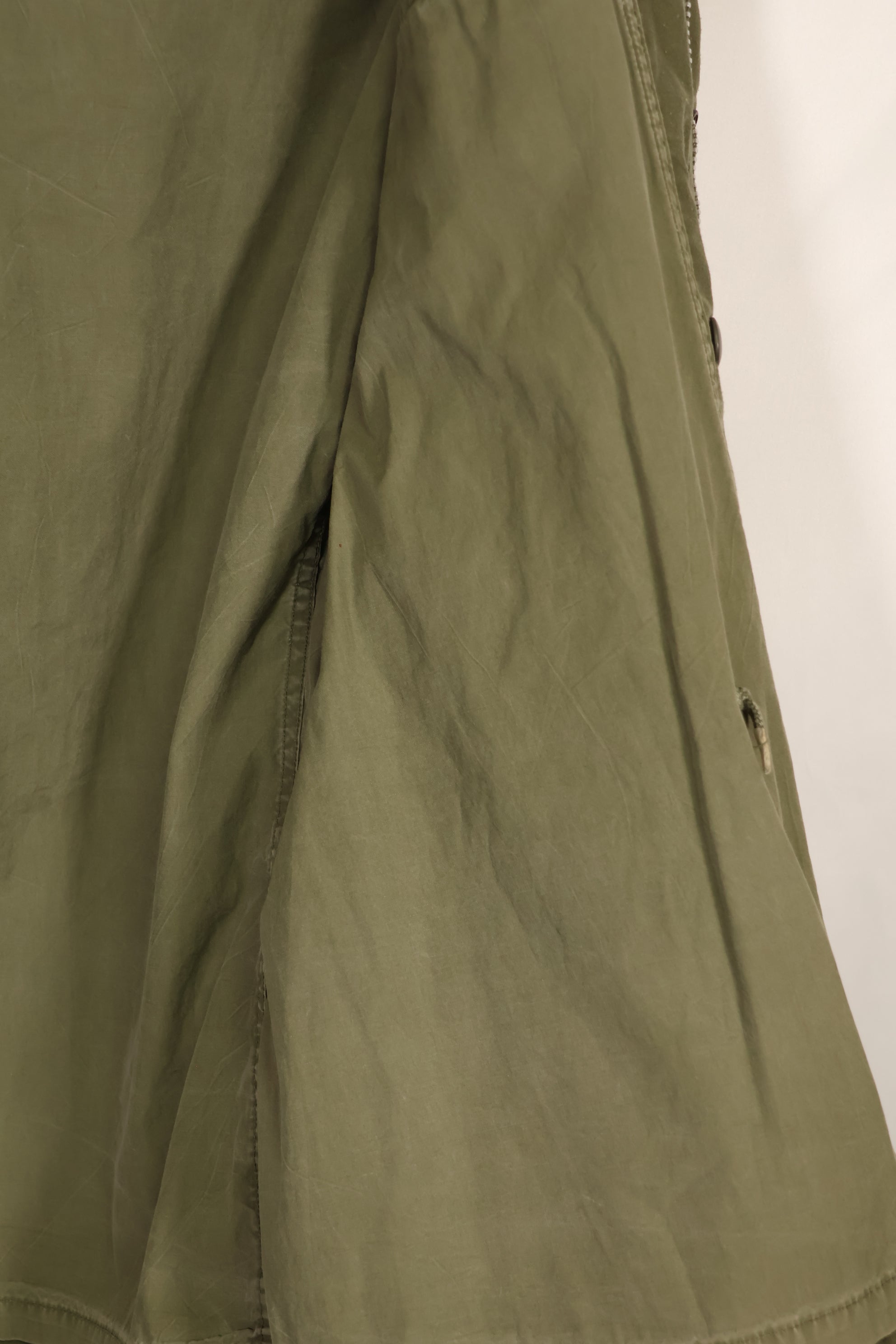 Real owned by former SF member, first model M65 field jacket, estimated 1965-1966, used.