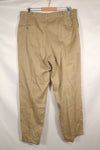 1960s, estimated 34-36 US Army cotton khaki pants, used.