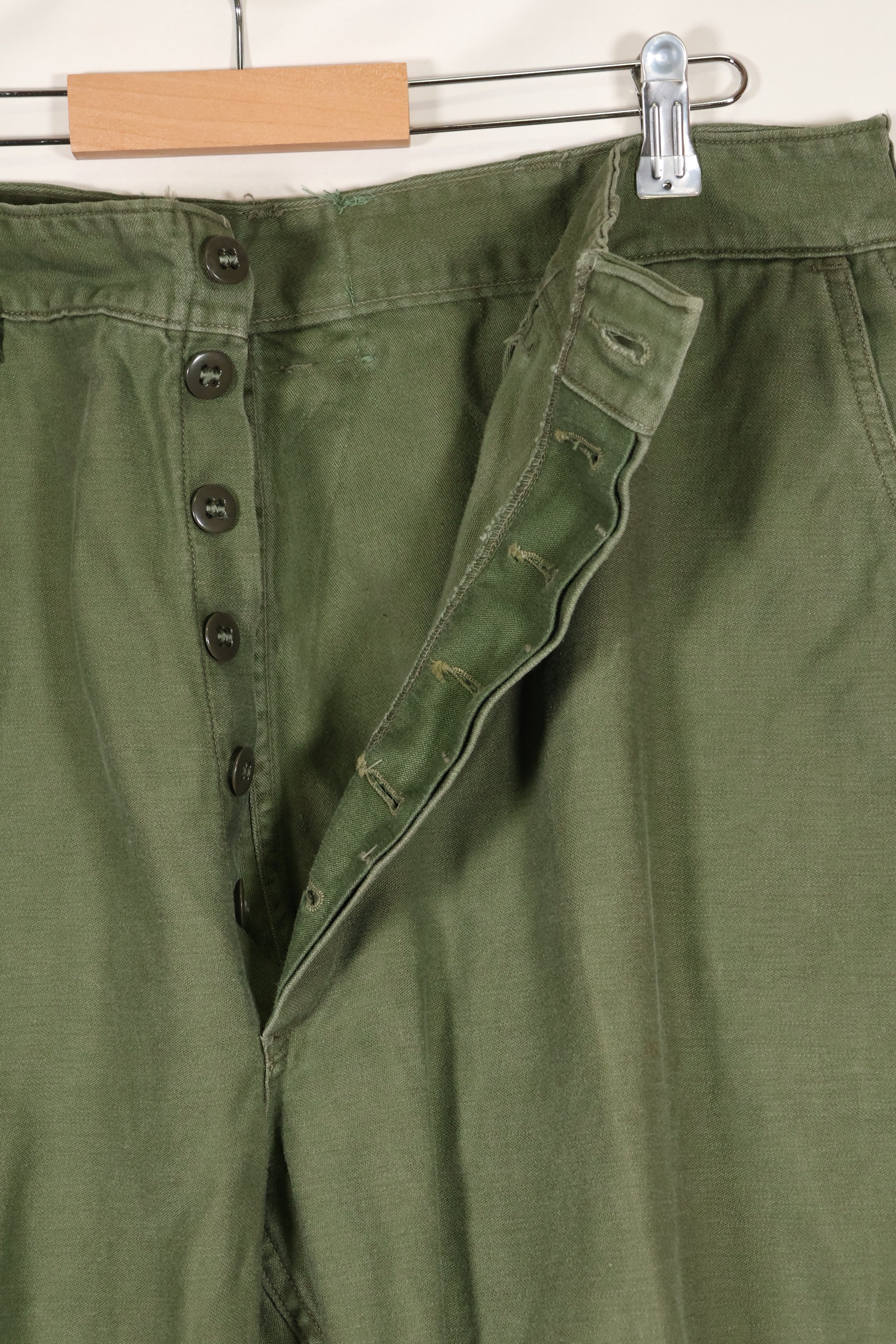 1960s lot, estimated 36 approx USMC P-56 utility pants, used.
