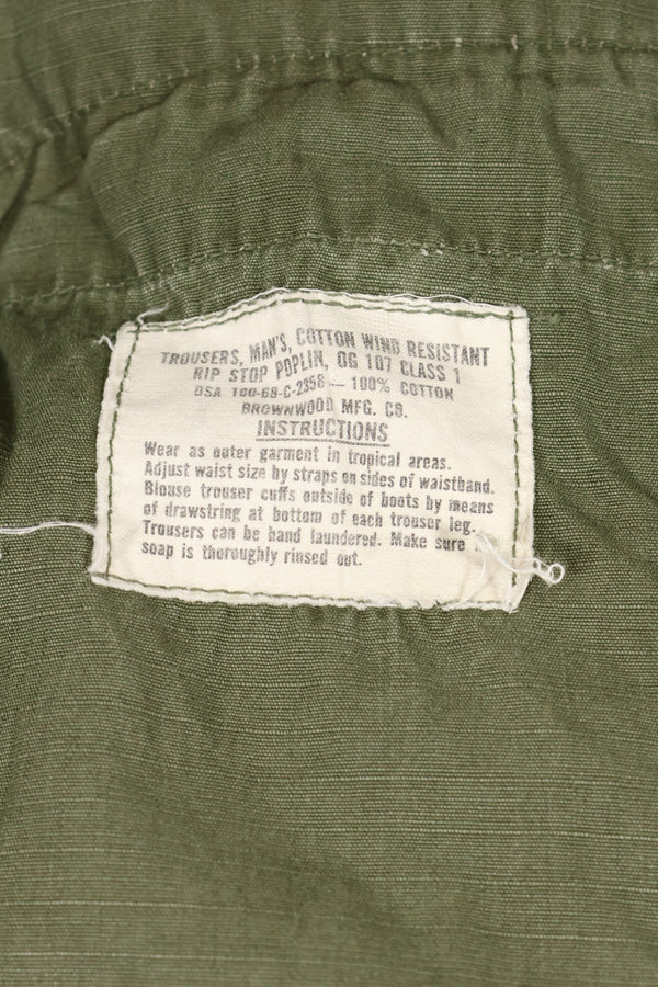 1968 Contract S-R 4th Model Jungle Fatigue Pants, used with fading and repairs.