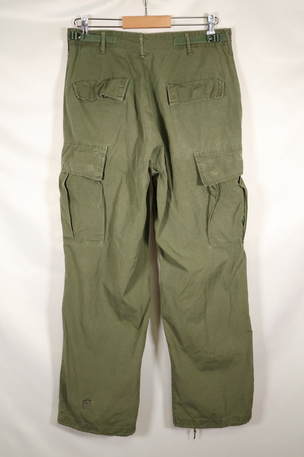 1968 Contract S-R 4th Model Jungle Fatigue Pants, used with fading and repairs.