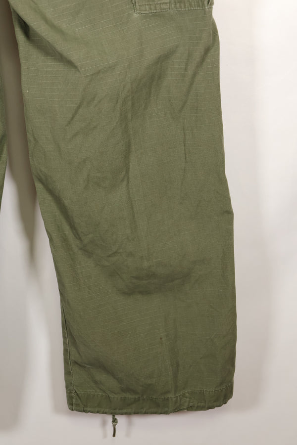 1968 Contract S-R 4th Model Jungle Fatigue Pants, used with fading and repairs.