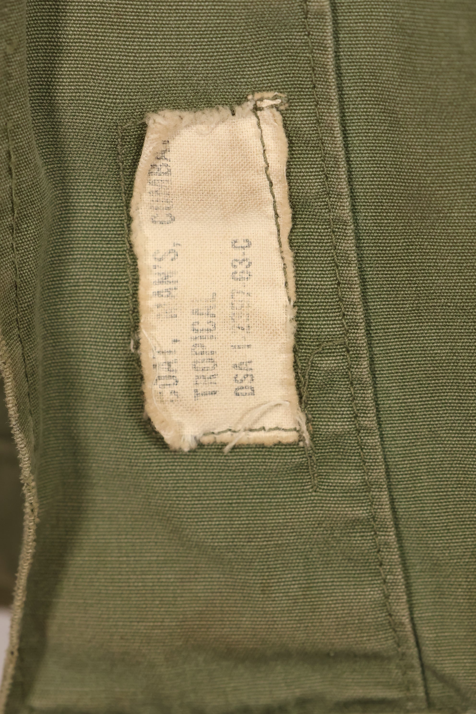 1963 Contract, estimated SMALL 1st Model Jungle Fatigue Jacket, used, stains, scratches.