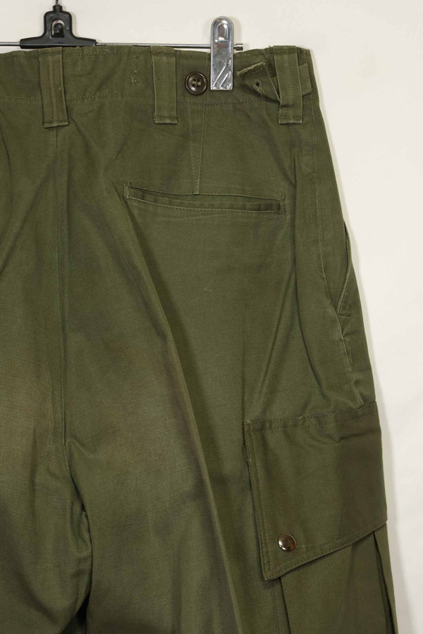 1940s-50s US Army M45 cotton field pants with modified cargo pockets, airborne use, used, B