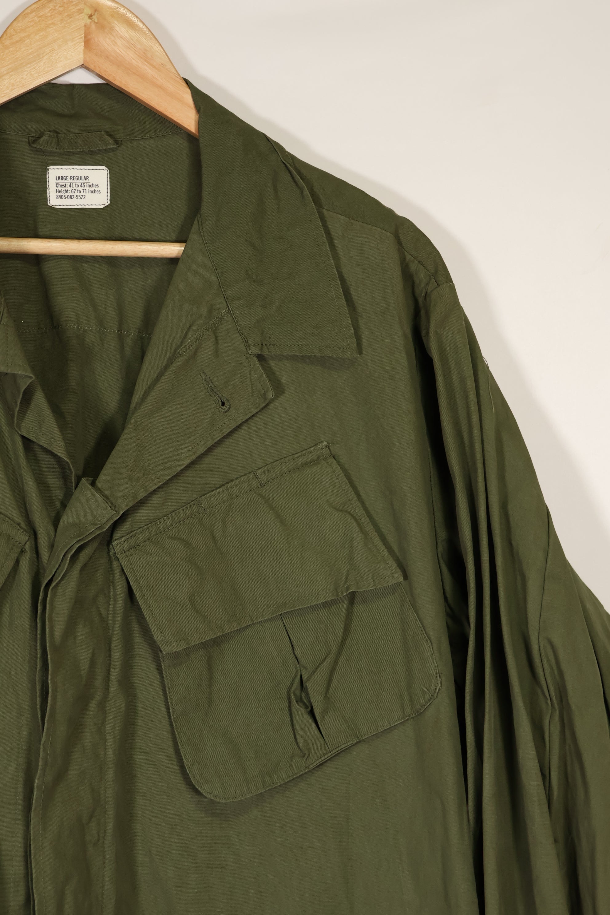 Real 1966-1967 3rd Model Jungle Fatigue Jacket L-R with damage.