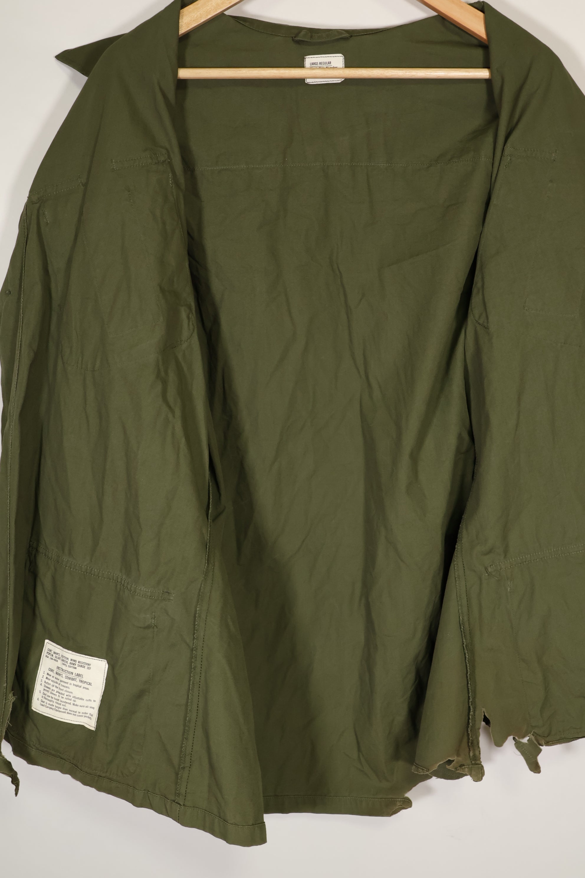 Real 1966-1967 3rd Model Jungle Fatigue Jacket L-R with damage.