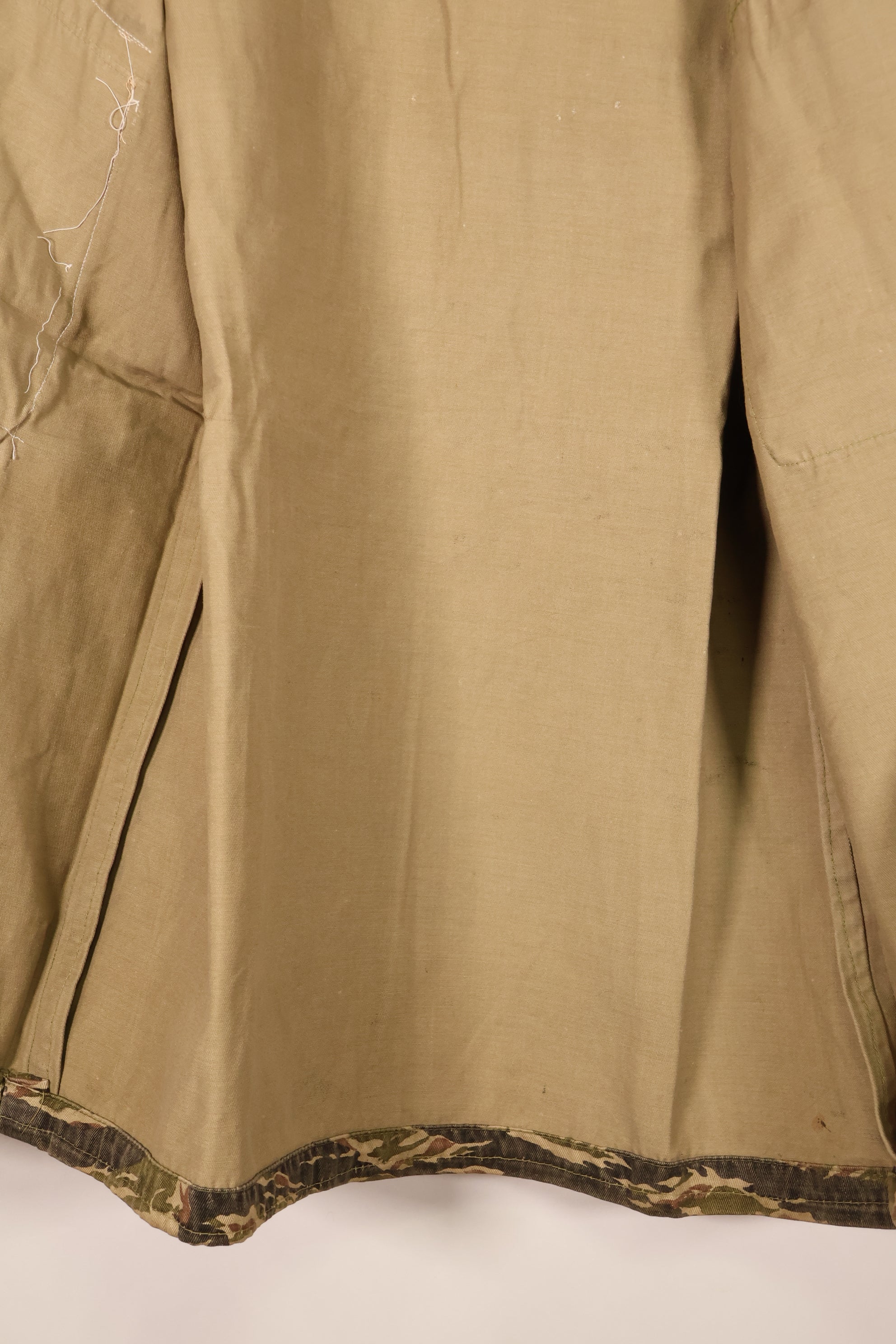 Late 1960s | Locally made | Estimated to be made in Vietnam or Thailand | Tiger-striped shirt | Used