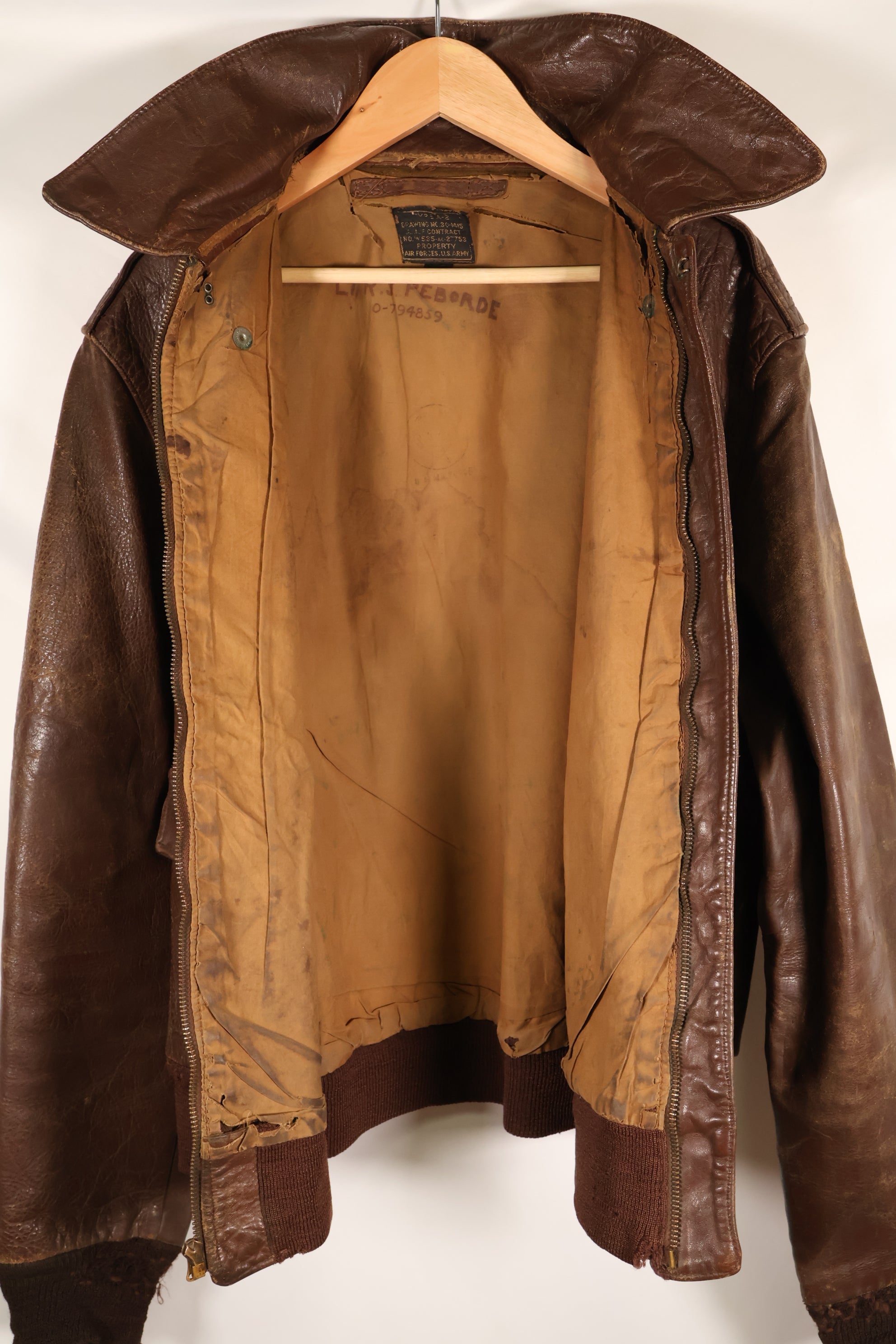 1940s size 42 WWII U.S. Army Air Corps USAAF A-2 flight jacket with name, used.