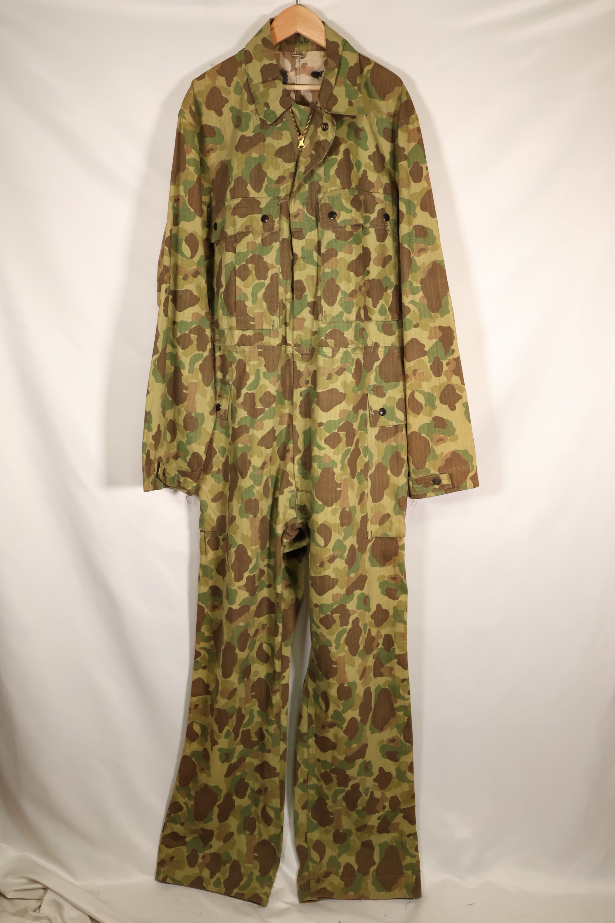 1940s U.S. Army & Marine Corps Frogskin camouflage coveralls in good condition.