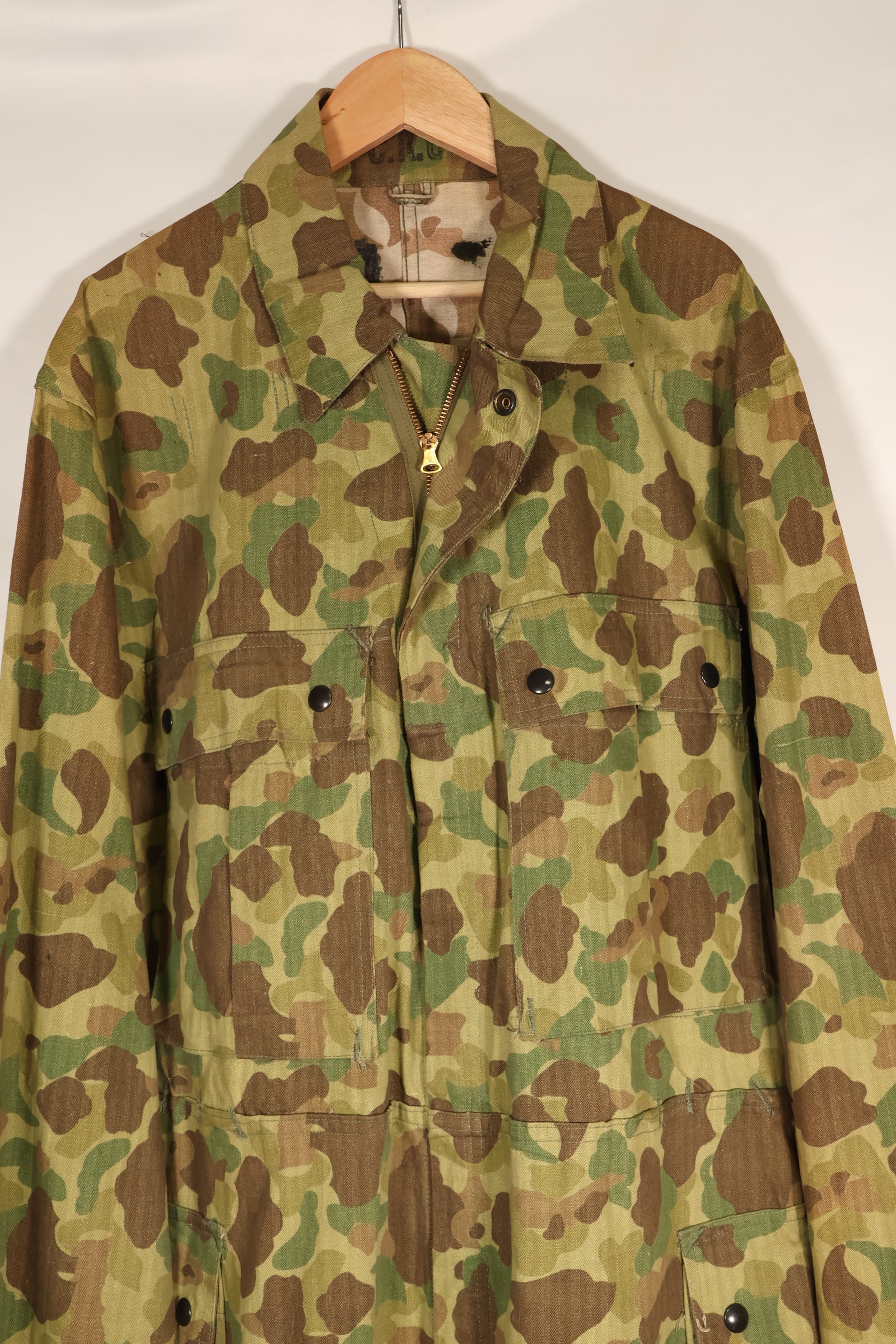 1940s U.S. Army & Marine Corps Frogskin camouflage coveralls in good condition.