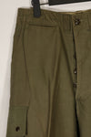 Real U.S. Army M45 pants with additional pocket modification, used.