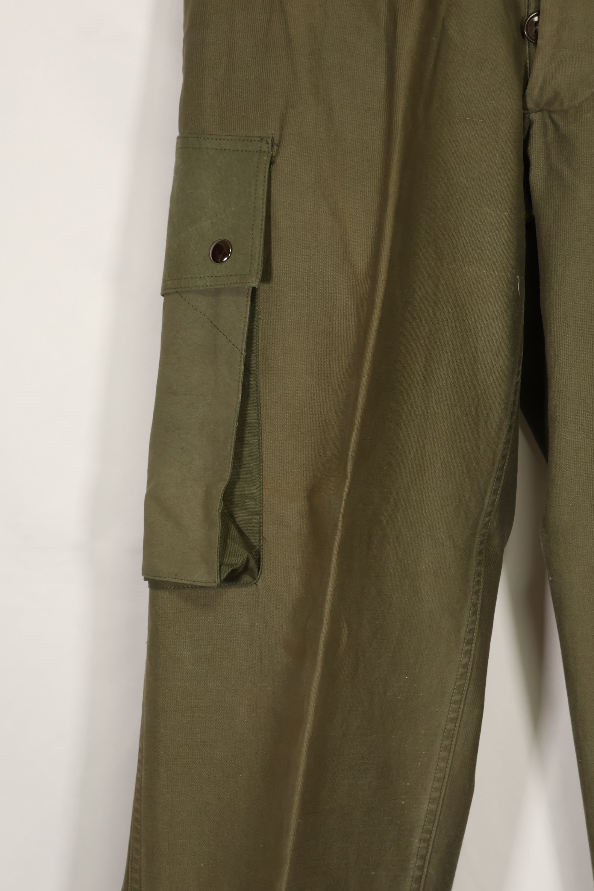 Real U.S. Army M45 pants with additional pocket modification, used.