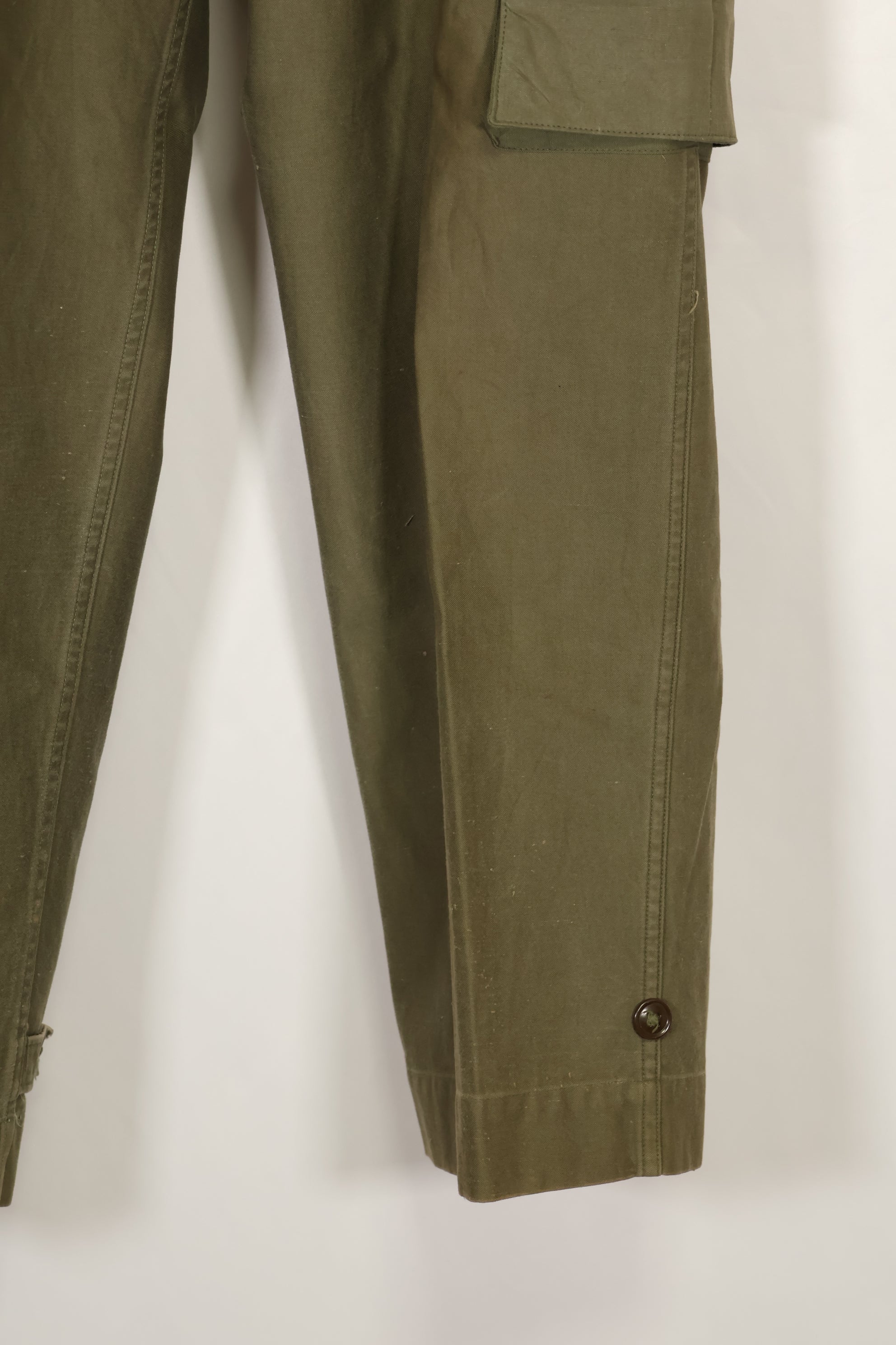 Real U.S. Army M45 pants with additional pocket modification, used.