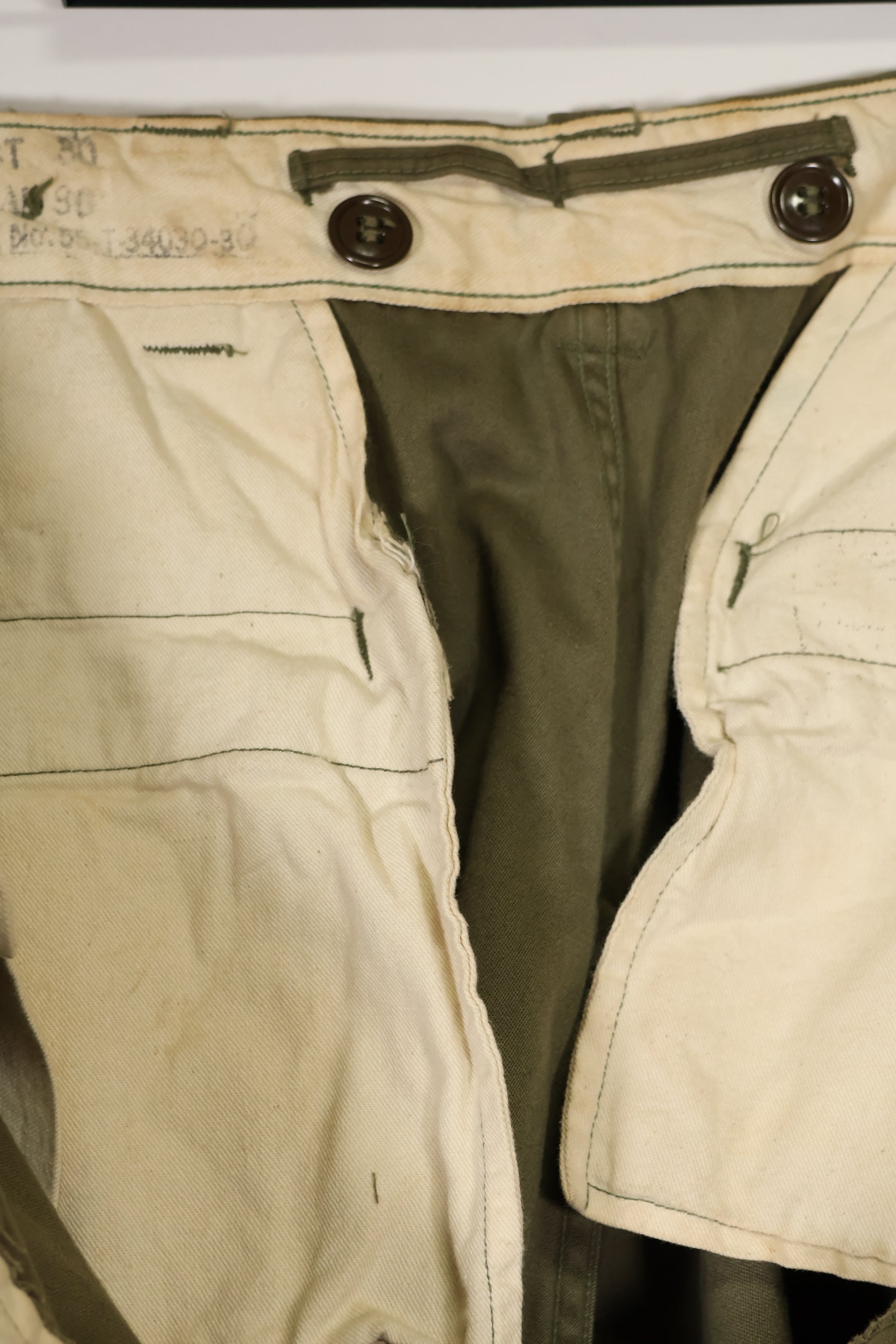 Real U.S. Army M45 pants with additional pocket modification, used.