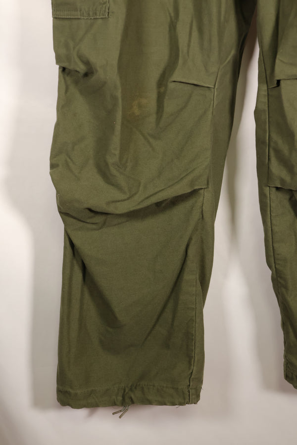 1970s lot, estimated size M-R, M65 field pants, cold weather specs, used.