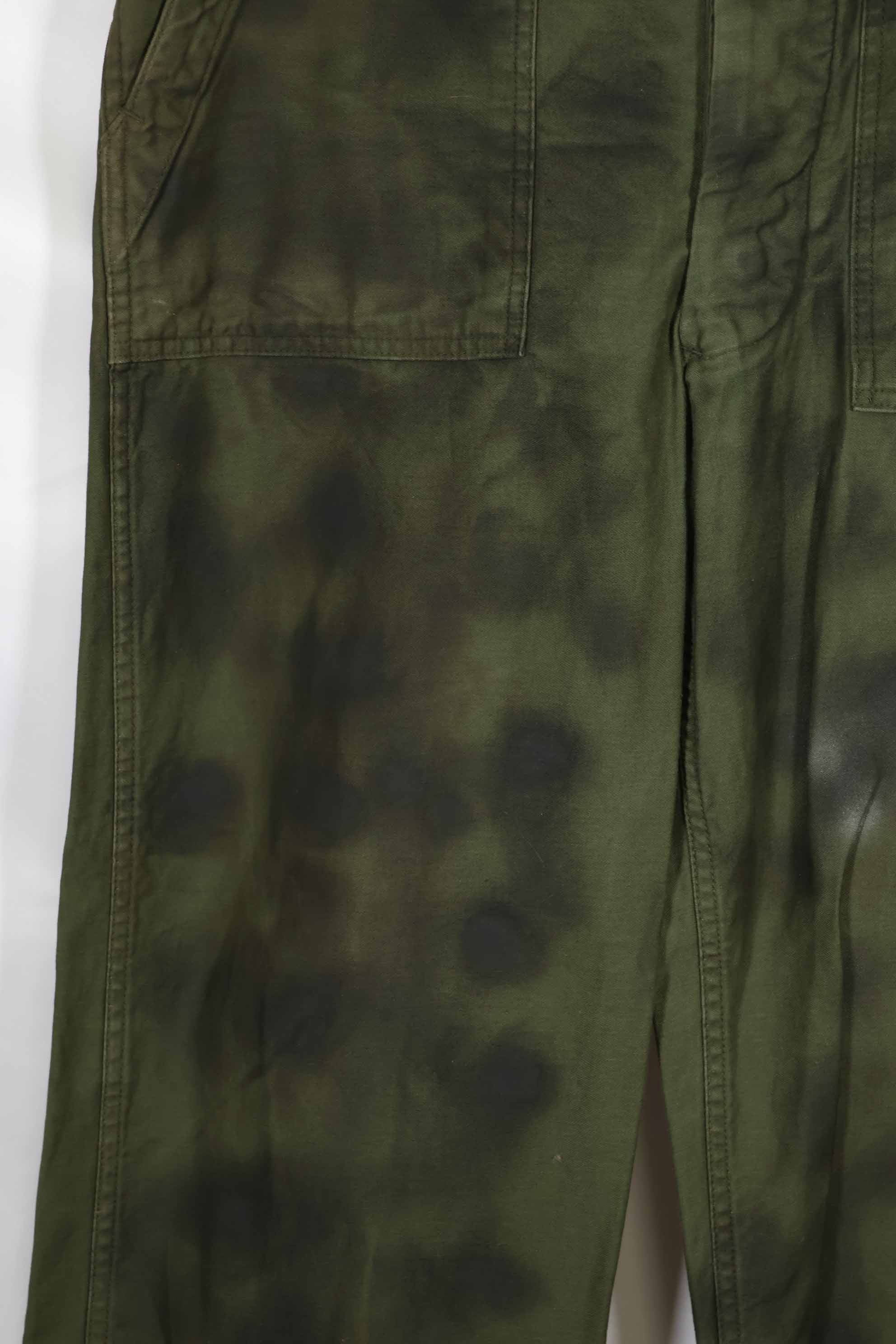 Real 1960s lot OG-107 baker pants, hand painted camouflage, used.