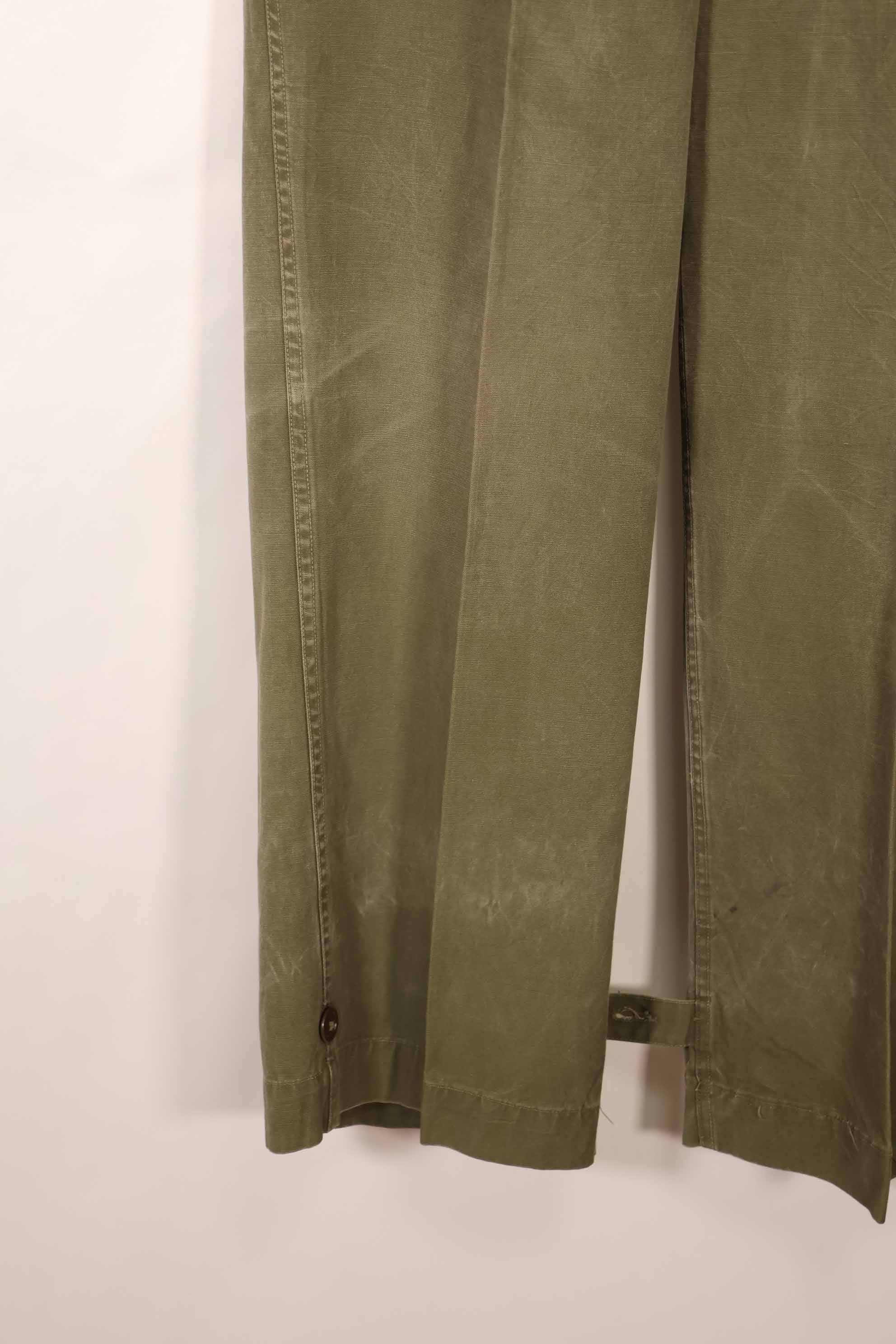 Real late 1940s - early 1950s M45 OD cotton field pants, used, strong signs of use.