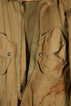 1940s 40R WWII M42 jump jacket without waist belt, stained, used.