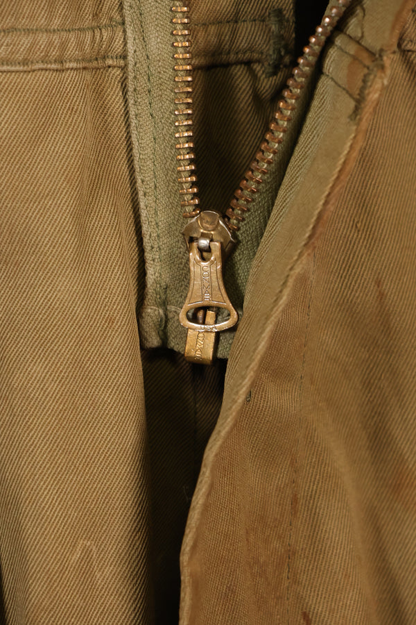 1940s 40R WWII M42 jump jacket without waist belt, stained, used.